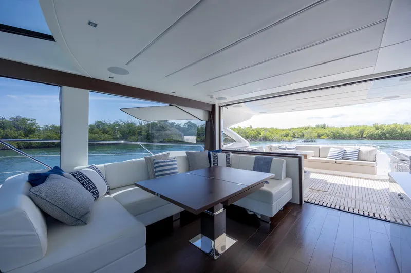 Slide: The Image of Luxurious interior of 2020 Sunseeker Predator 74 XPS yacht with elegant seating and scenic views. - 81