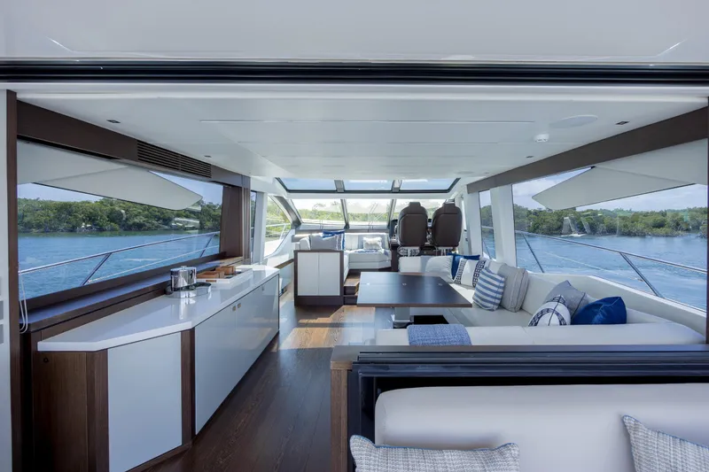 Slide: The Image of Luxurious interior of 2020 Sunseeker Predator 74 XPS yacht with modern furnishings and scenic views. - 82