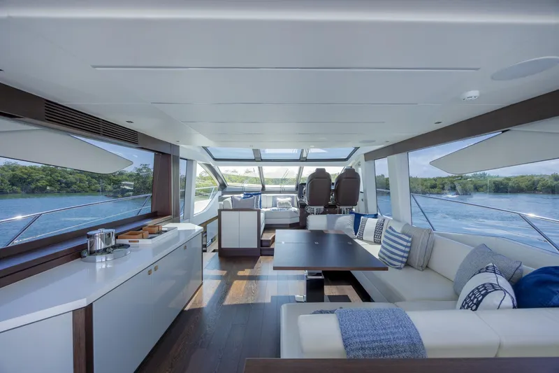 Slide: The Image of Luxurious interior of 2020 Sunseeker Predator 74 XPS yacht with modern furnishings and scenic views. - 83