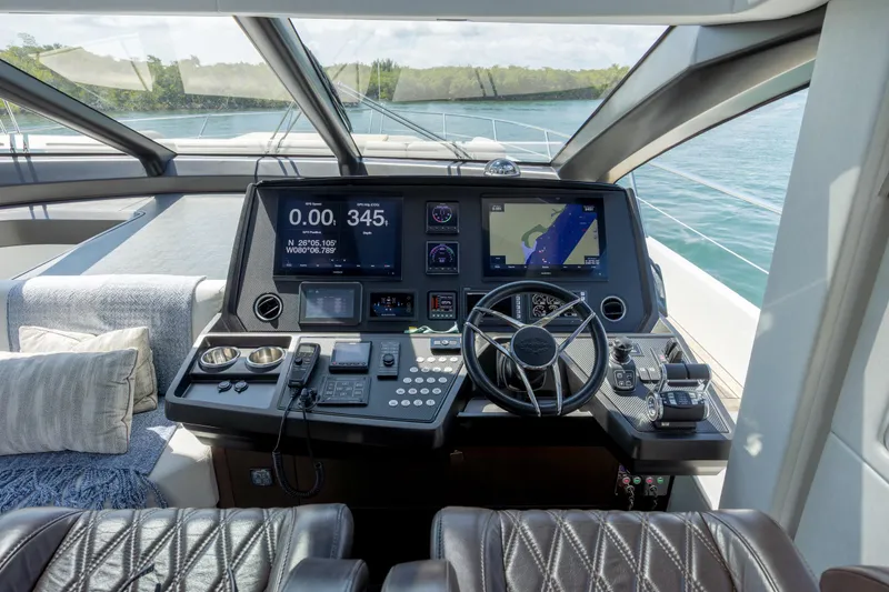 Slide: The Image of Helm of 2020 Sunseeker Predator 74 XPS yacht with advanced navigation controls. - 88