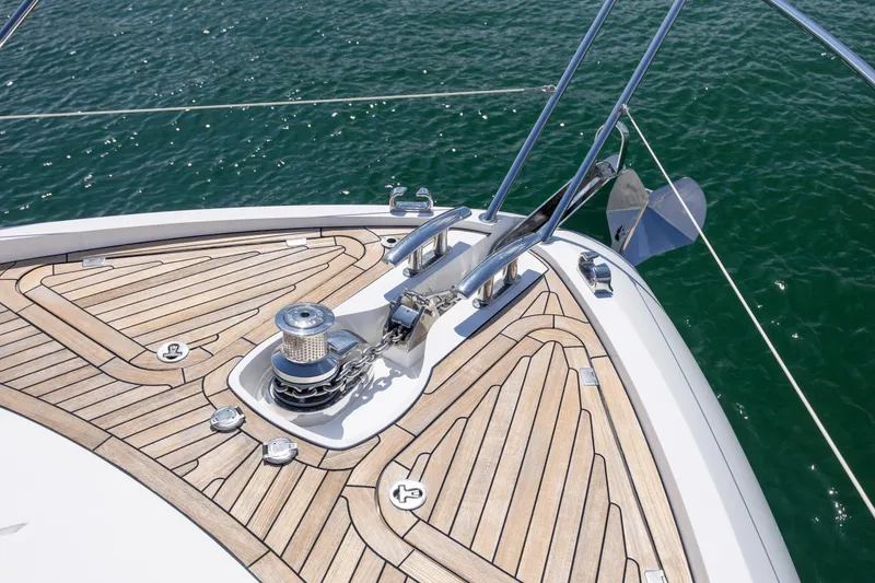 Slide: The Image of Bow of 2020 Sunseeker Predator 74 XPS yacht with teak decking and anchor. - 93