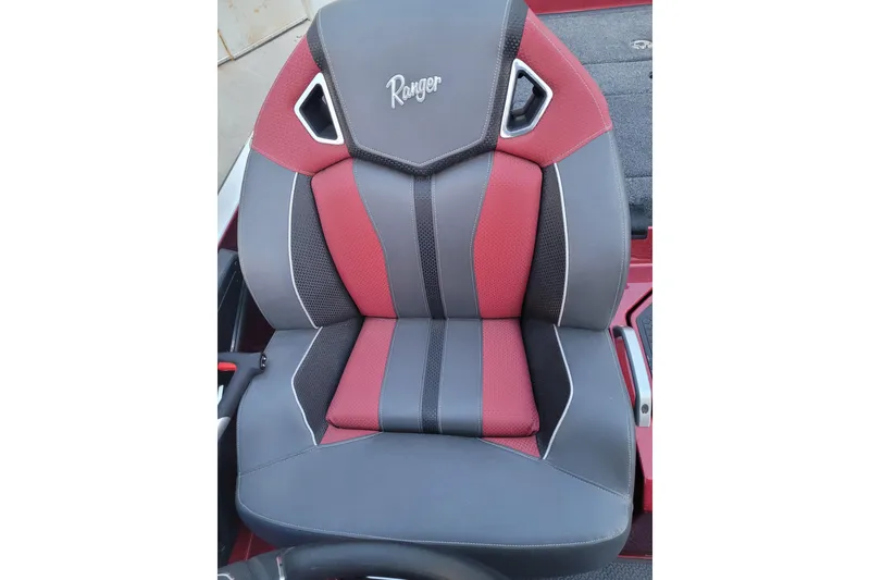 Slide: The Image of 2024 Ranger Z520R Cup-Equipped boat seat, featuring red and gray design with logo. - 15