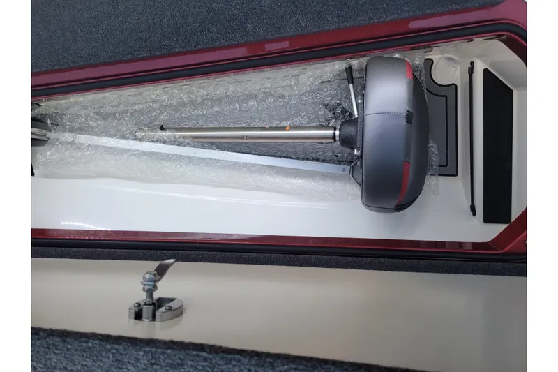 Slide: The Image of 2024 Ranger Z520R Cup-Equipped storage compartment with bubble-wrapped equipment. - 19