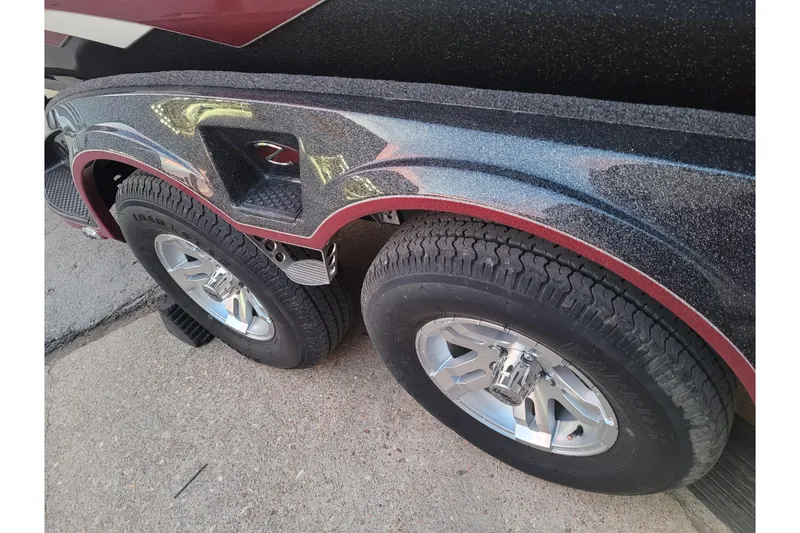 Slide: The Image of 2024 Ranger Z520R Cup-Equipped trailer with dual wheels and metallic fender detailing. - 2