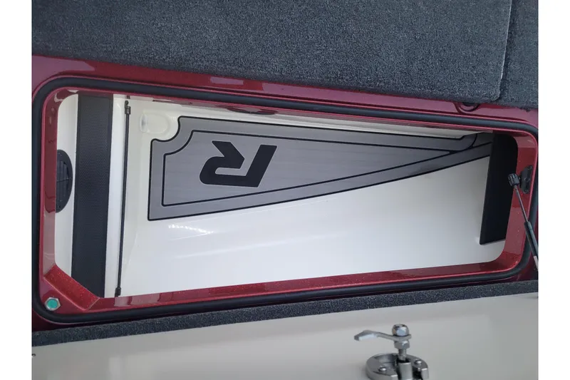 Slide: The Image of 2024 Ranger Z520R Cup-Equipped storage compartment with sleek interior design. - 21