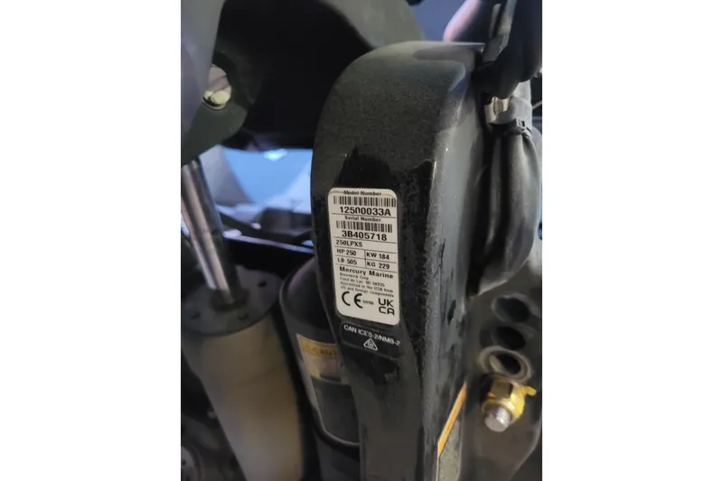 Slide: The Image of Close-up of a 2024 Ranger Z520R Cup-Equipped engine label with specifications. - 28