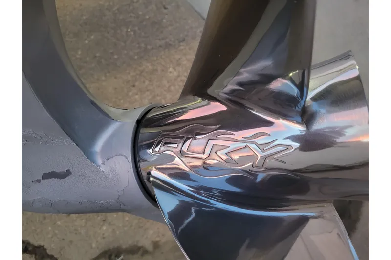 Slide: The Image of Close-up of a 2024 Ranger Z520R Cup-Equipped propeller with "Fury" engraving. - 5
