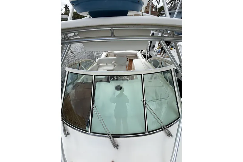 Slide: The Image of 2005 Albemarle 30 Express boat with spacious cockpit and windshield view. - 12