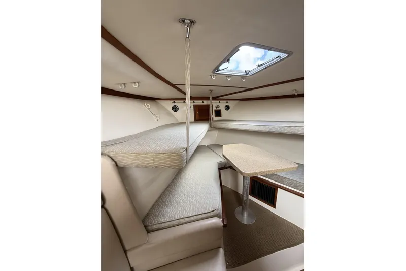 Slide: The Image of Interior of 2005 Albemarle 30 Express boat with seating and table. - 23
