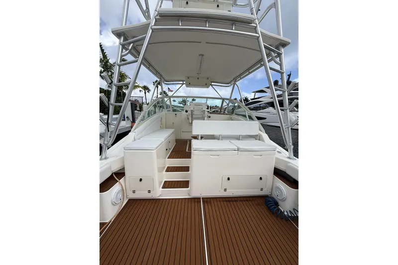 Slide: The Image of 2005 Albemarle 30 Express boat interior with teak flooring and seating. - 27