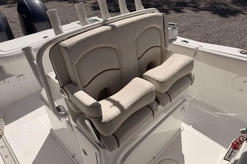 Slide: The Image of 2021 Sea Hunt Gamefish 27 boat with comfortable forward seating and dual outboard motors. - 8