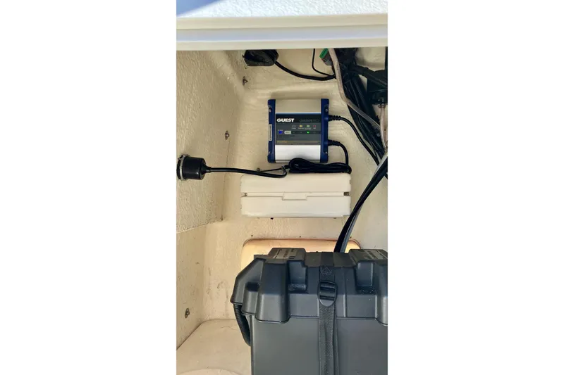 Slide: The Image of Electrical setup inside a 2015 Boston Whaler 170 Montauk boat compartment. - 3