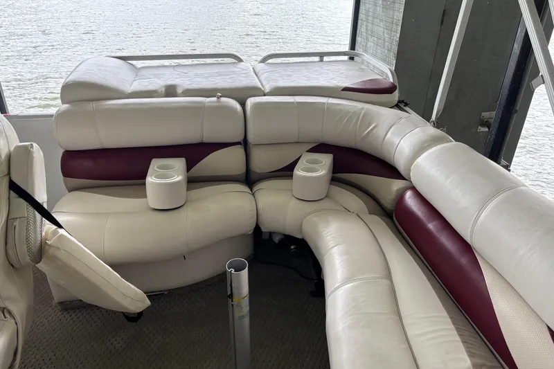 Slide: The Image of Luxurious seating on 2007 Crest 2570 III XRS pontoon boat with cup holders. - 20