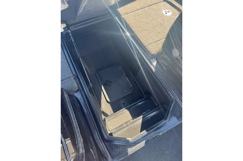 Slide: The Image of Storage compartment of 2021 Nitro ZV19 Sport boat, open and empty. - 13