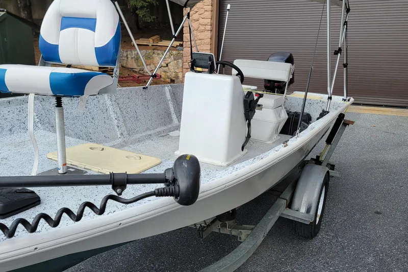 Slide: The Image of 2021 HORIZEN CS 170 CC boat on trailer with blue and white seating. - 10