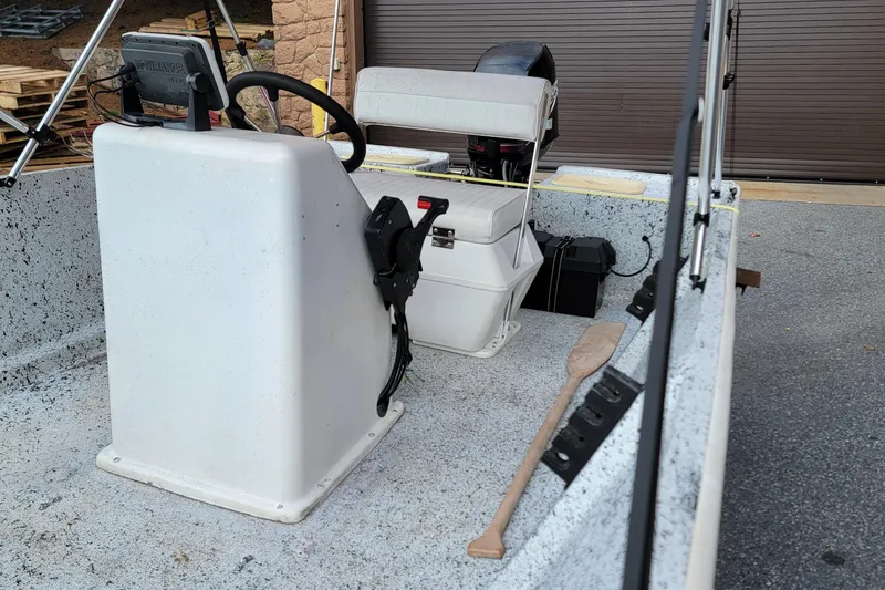 Slide: The Image of 2021 HORIZEN CS 170 CC boat interior with steering console and seating. - 11