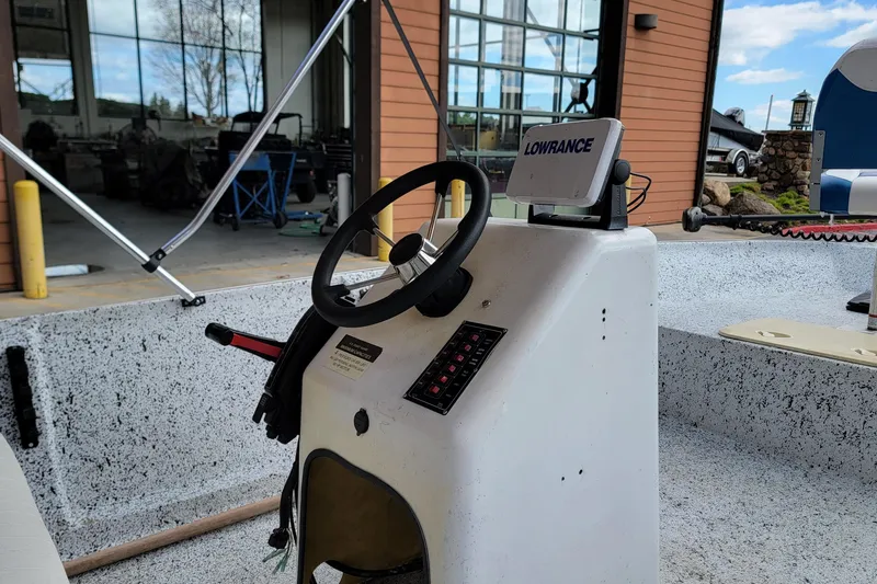 Slide: The Image of Boat console with steering wheel and Lowrance device, HORIZEN CS 170 CC, 2021 model. - 2