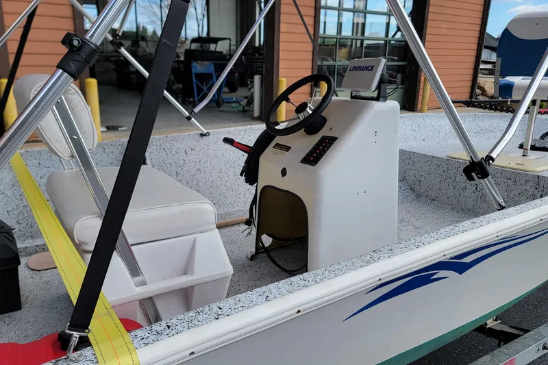 Slide: The Image of 2021 HORIZEN CS 170 CC boat interior with steering console and seating. - 3