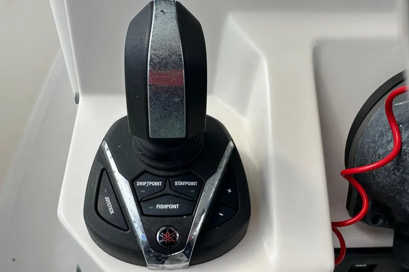 Slide: The Image of Joystick control panel on 2022 Sailfish 290 CC boat, featuring DriftPoint and StayPoint buttons. - 25