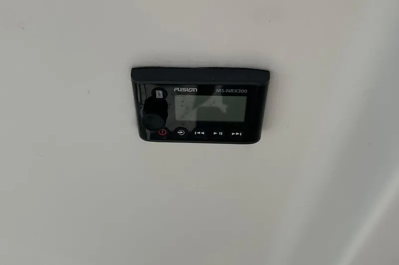 Slide: The Image of Fusion MS-NRX300 marine stereo on 2022 Sailfish 290 CC boat dashboard. - 41
