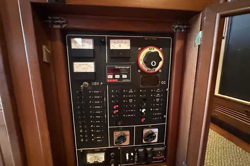 Slide: The Image of Electrical control panel inside a 1987 Kadey-Krogen Manatee 36 boat. - 26