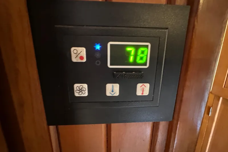 Slide: The Image of Thermostat control panel on 1987 Kadey-Krogen Manatee 36, displaying temperature at 78 degrees. - 27