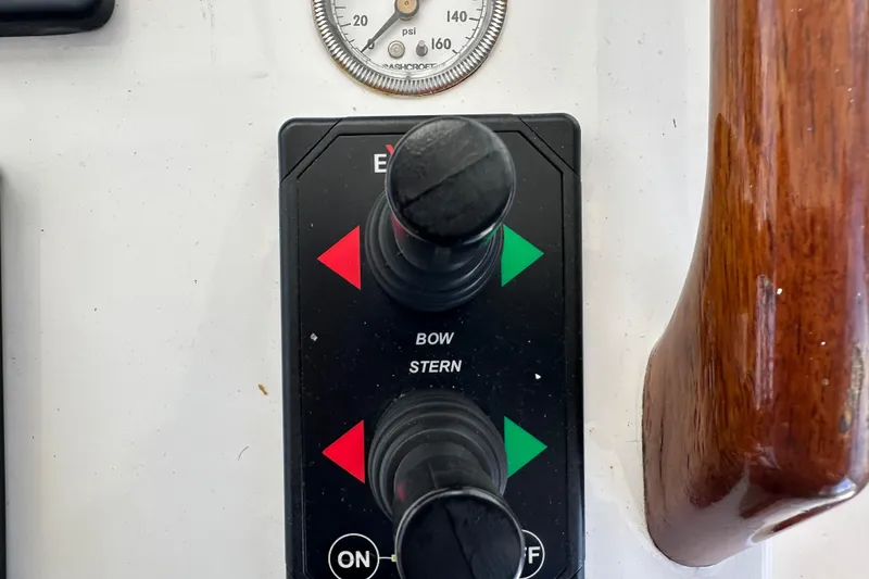 Slide: The Image of Control panel of a 1987 Kadey-Krogen Manatee 36 boat with bow and stern controls. - 60