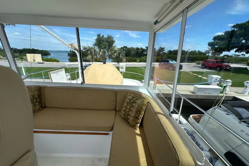 Slide: The Image of Interior view of 1987 Kadey-Krogen Manatee 36 yacht with scenic marina backdrop. - 71