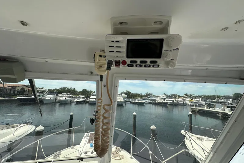 Slide: The Image of Interior view of 1987 Kadey-Krogen Manatee 36 yacht, overlooking marina with boats. - 73