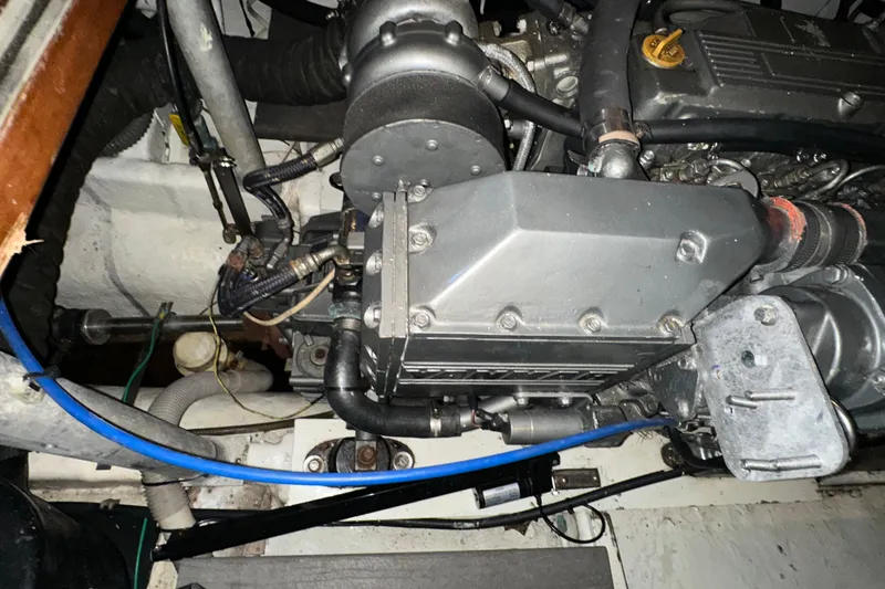 Slide: The Image of Engine compartment of a 1987 Kadey-Krogen Manatee 36 boat, showcasing mechanical components. - 91