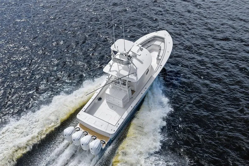 Slide: The Image of 2018 Regulator 41 boat cruising on open water, aerial view. - 11