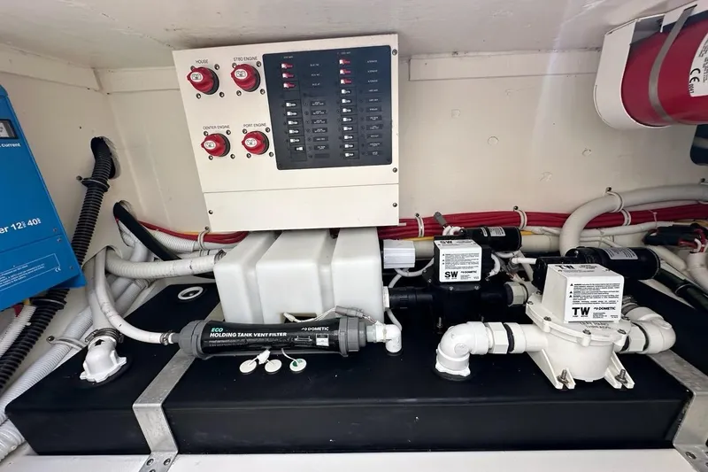Slide: The Image of Electrical and plumbing system of 2021 Tiara Sport 43 LS boat. - 24