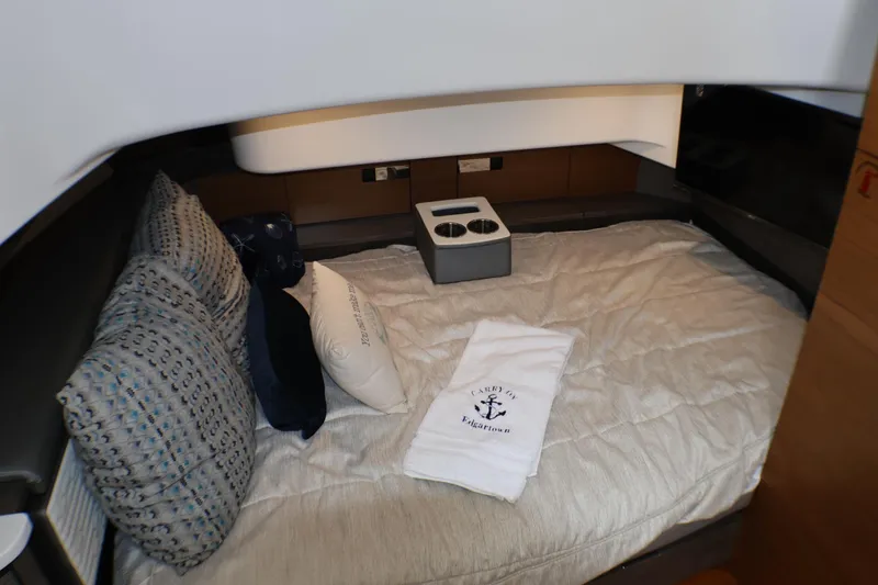 Slide: The Image of Luxurious cabin interior of 2021 Tiara Sport 43 LS yacht with cozy bedding and pillows. - 31