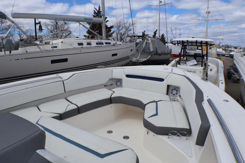Slide: The Image of 2021 Tiara Sport 43 LS luxury boat with spacious seating and sleek design. - 34
