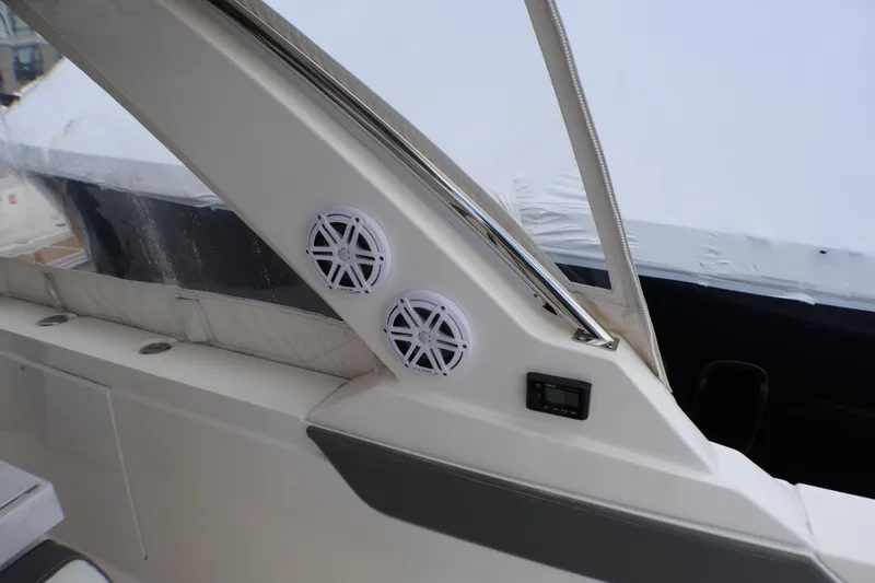 Slide: The Image of Interior view of 2021 Tiara Sport 43 LS boat, featuring speakers and control panel. - 42