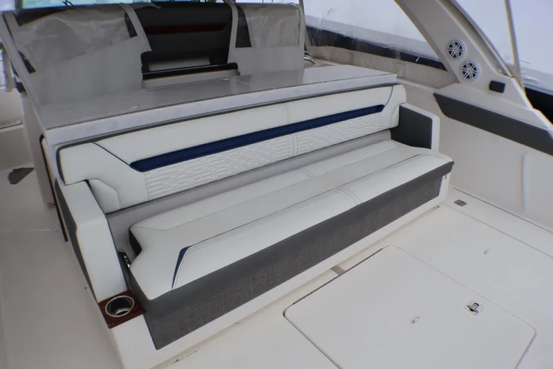Slide: The Image of 2021 Tiara Sport 43 LS boat interior with luxurious seating and modern design. - 43