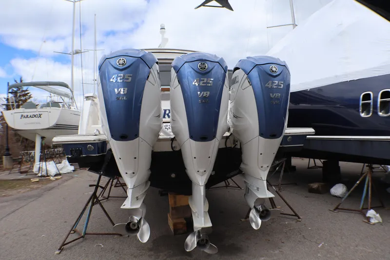 Slide: The Image of 2021 Tiara Sport 43 LS with triple Yamaha 425 V8 outboard engines. - 47