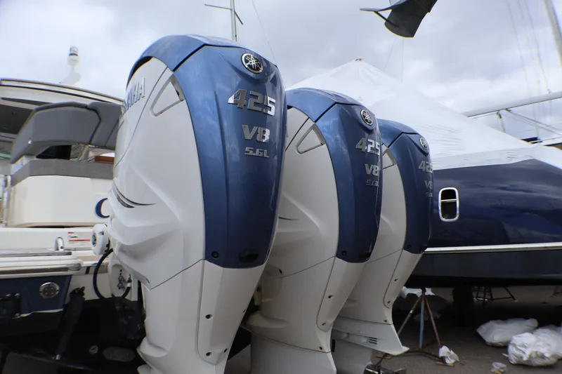 Slide: The Image of Triple Yamaha 425 V8 outboard engines on a 2021 Tiara Sport 43 LS boat. - 48