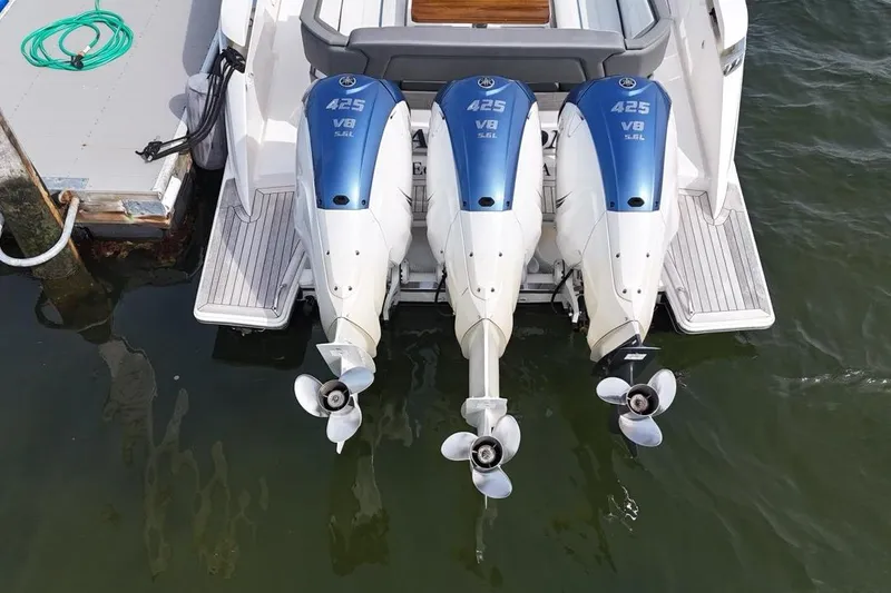 Slide: The Image of Triple Yamaha 425 V8 engines on a 2021 Tiara Sport 43 LS boat. - 7