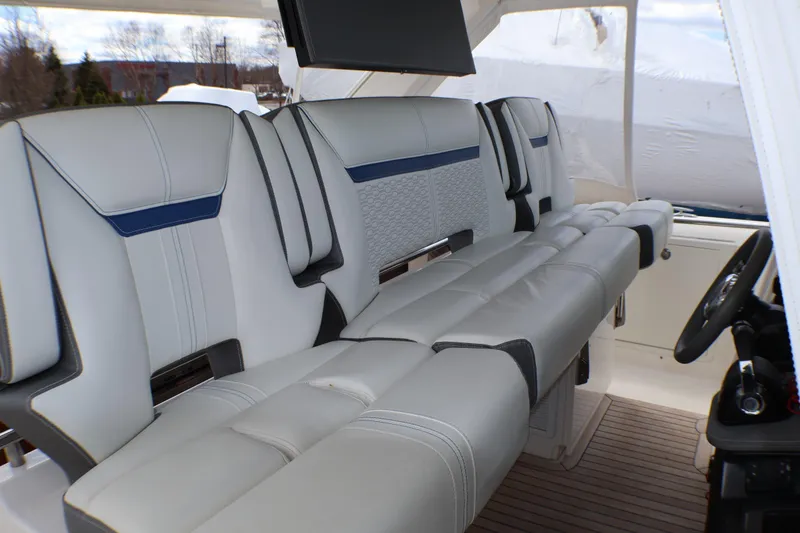 Slide: The Image of 2021 Tiara Sport 43 LS boat interior with luxurious seating and modern design. - 73