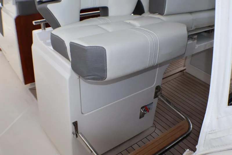 Slide: The Image of Luxury seating on 2021 Tiara Sport 43 LS boat, featuring sleek design and premium materials. - 74