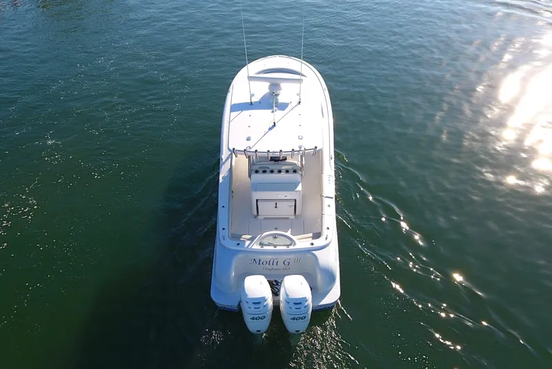 Slide: The Image of 2023 Mag Bay 33 CC boat on water, aerial view. - 12