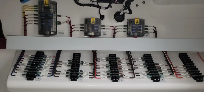 Slide: The Image of Electrical wiring panel of 2023 Mag Bay 33 CC boat. - 39