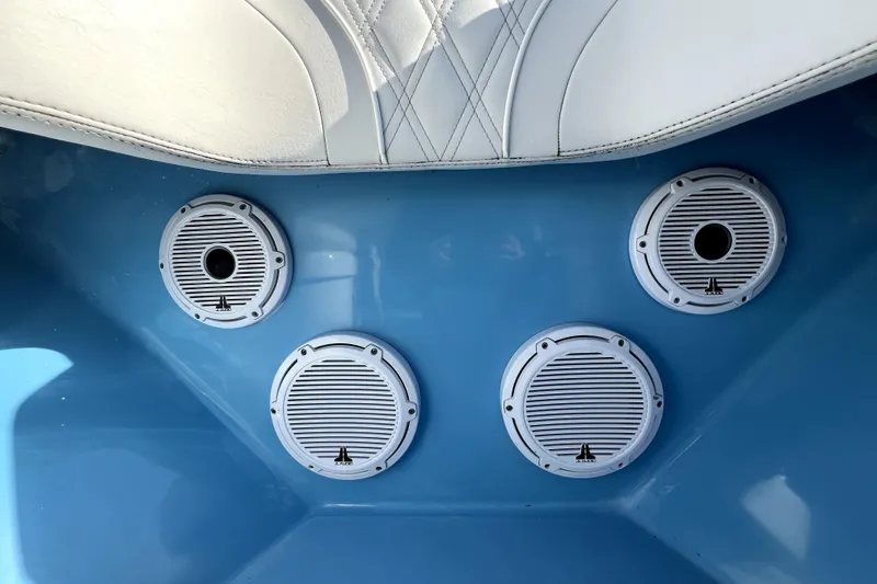Slide: The Image of 2023 Contender 30 ST boat interior with four white marine speakers. - 27