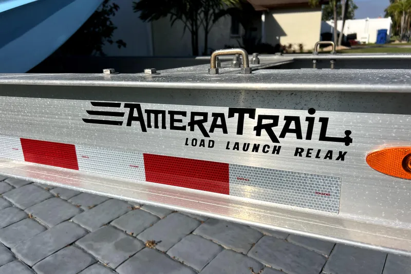 Slide: The Image of AmeraTrail trailer with reflective decals, designed for Contender 30 ST 2023 boat. - 43