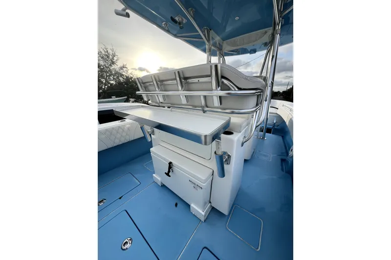 Slide: The Image of 2023 Contender 30 ST boat interior with blue deck and seating area. - 5