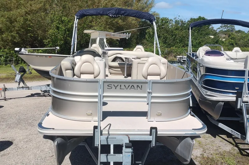 The Image of 2016 Sylvan Mirage Fish 8522 Party Fish pontoon boat on trailer. - 0