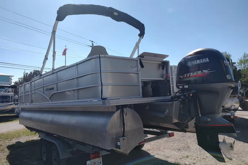 Slide: The Image of 2016 Sylvan Mirage Fish 8522 pontoon boat with Yamaha VMAX engine on trailer. - 3