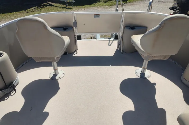 Slide: The Image of 2016 Sylvan Mirage Fish 8522 Party Fish boat interior with two swivel seats. - 9