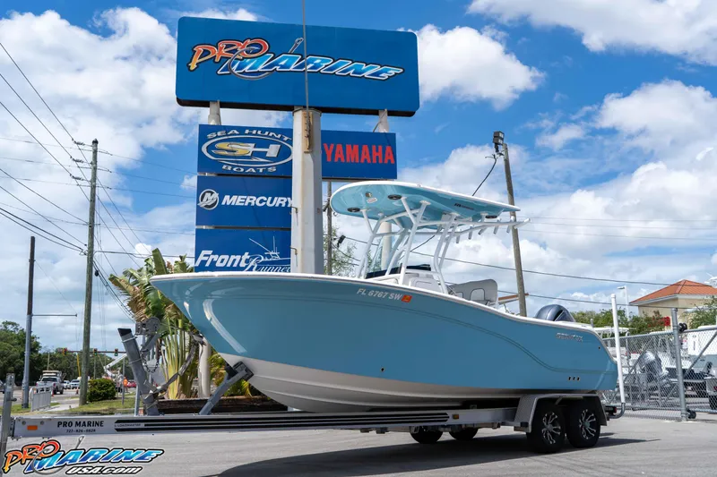 Slide: The Image of 2021 Sea Fox 228 Commander boat on trailer at Pro Marine dealership. - 2